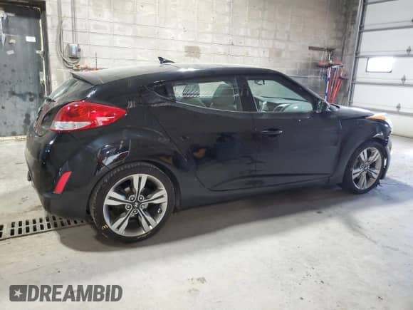 2012 Hyundai Veloster w/Gray Int с VIN KMHTC6AD0CU028205, выставлен на аукционе Copart как лот 80826795 с пробегом 88 244 миль миль и Списание • Salvage title. История ставок и продаж доступна на DreamBid. Изображение 3.