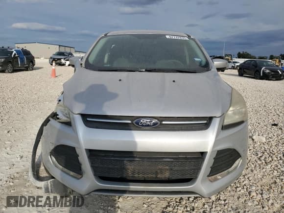 ✅ 2016 Ford Escape SE • VIN: 1FMCU0G77GUA09622 • Lot: 82742835. Listed on Copart with 68,614 mi. Free auction sales archive from the USA and detailed vehicle history report at DreamBid. Image 5.