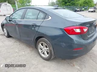 ✅ 2018 Chevrolet Cruze LT • VIN: 1G1BE5SM1J7226878 • Lot: 42276859. Listed on IAAI with 100,112 mi. Free auction sales archive from the USA and detailed vehicle history report at DreamBid. Image 3.