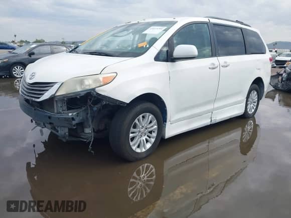 2011 Toyota Sienna XLE AAS with VIN 5TDYK3DC1BS106301, listed as a IAAI auction lot 43423294 with 158,803 mi miles and . Bid and sale history available at DreamBid. Image 2.
