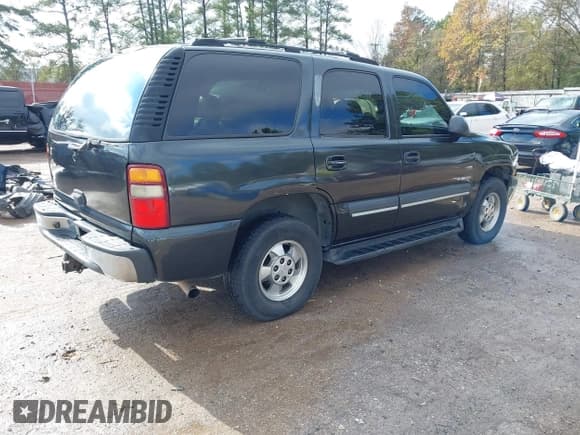 ✅ 2003 Chevrolet Tahoe LS • VIN: 1GNEC13Z13R155130 • Lot: 43812057. Listed on IAAI with 233,340 mi. Free auction sales archive from the USA and detailed vehicle history report at DreamBid. Image 4.
