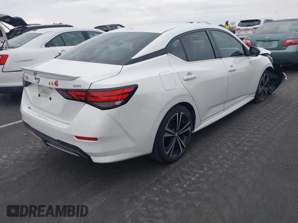 ✅ 2022 Nissan Sentra SR • VIN: 3N1AB8DVXNY316606 • Лот: 43337195. Опубликован ранее на IAAI с пробегом 20 927 миль. Бесплатный доступ к архиву аукционных продаж из США и подробный отчёт об истории автомобиля на DreamBid. Изображение 4.