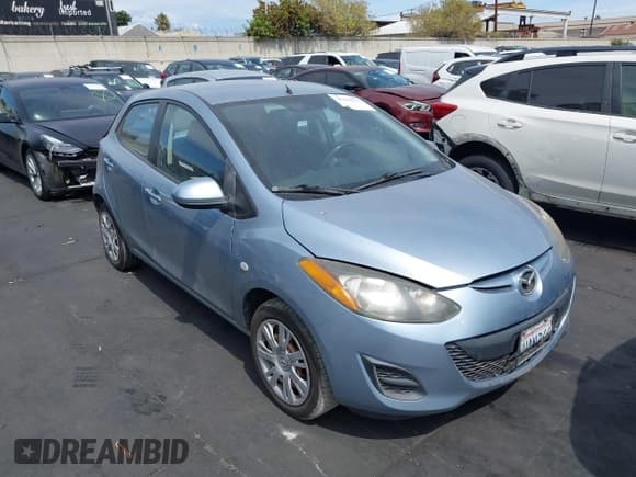 ✅ 2013 Mazda 2 Sport • VIN: JM1DE1KZ1D0161824 • Lot: 43214717. Listed on IAAI with 280,407 mi. Free auction sales archive from the USA and detailed vehicle history report at DreamBid. Image 1.