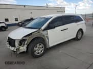 ✅ 2013 Honda Odyssey LX • VIN: 5FNRL5H2XDB082747 • Lot: 80600695. Listed on Copart with 110,873 mi. Free auction sales archive from the USA and detailed vehicle history report at DreamBid. Image 1.