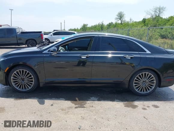 ✅ 2015 Lincoln MKZ Hybrid • VIN: 3LN6L2LU7FR623101 • Лот: 42039230. Опубликован ранее на IAAI с пробегом 161 307 миль. Бесплатный доступ к архиву аукционных продаж из США и подробный отчёт об истории автомобиля на DreamBid. Изображение 14.