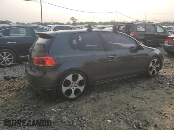 ✅ 2012 Volkswagen Golf GTI w/Conv & Sunroof • VIN: WVWEV7AJ7CW009478 • Lot: 58974025. Listed on Copart with 124,472 mi. Free auction sales archive from the USA and detailed vehicle history report at DreamBid. Image 3.