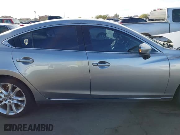 ✅ 2015 Mazda 6 i Touring • VIN: JM1GJ1V56F1210501 • Lot: 41539315. Listed on IAAI with 98,669 mi. Free auction sales archive from the USA and detailed vehicle history report at DreamBid. Image 13.