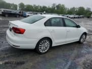 ✅ 2015 Volkswagen Jetta SE • VIN: 3VWD17AJ9FM233571 • Lot: 61436735. Listed on Copart with 58,690 mi. Free auction sales archive from the USA and detailed vehicle history report at DreamBid. Image 3.