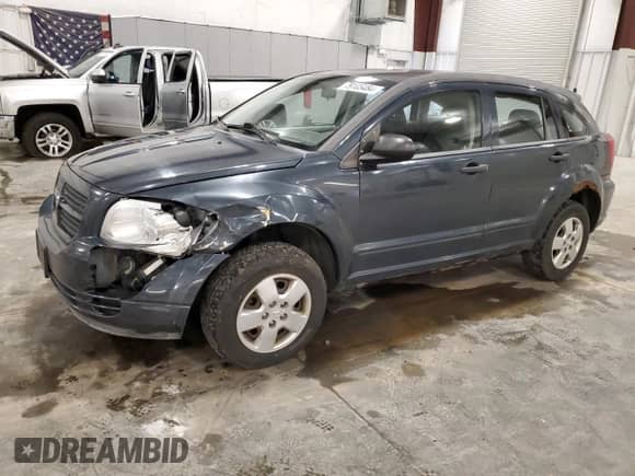 2007 Dodge Caliber with VIN 1B3HB28B37D287949, listed as a Copart auction lot 79105484 with 201,553 mi miles and Salvage title. Bid and sale history available at DreamBid. Image 1.