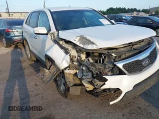 ✅ 2012 Kia Sorento LX • VIN: 5XYKT3A1XCG273227 • Lot: 43086955. Listed on IAAI with 106,630 mi. Free auction sales archive from the USA and detailed vehicle history report at DreamBid. Image 1.