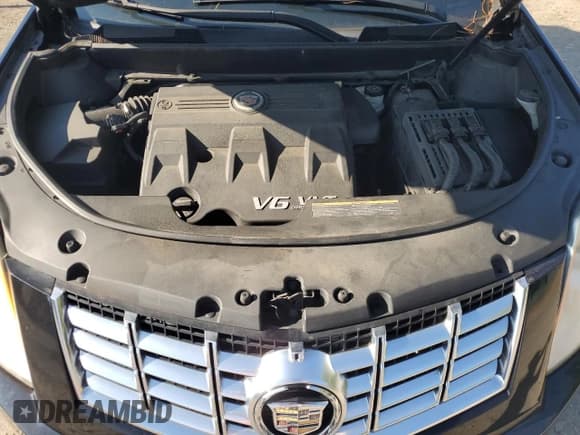 ✅ 2015 Cadillac SRX • VIN: 3GYFNAE31FS617018 • Lot: 81499985. Listed on Copart with 179,774 mi. Free auction sales archive from the USA and detailed vehicle history report at DreamBid. Image 12.