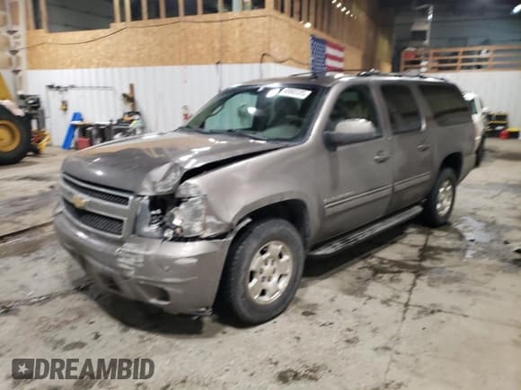 ✅ 2011 Chevrolet Suburban LS • VIN: 1GNSKHE33BR296058 • Lot: 42045125. Listed on Copart with 218,708 mi. Free auction sales archive from the USA and detailed vehicle history report at DreamBid. Image 1.