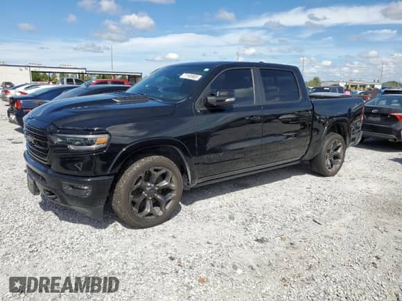 2021 Ram 1500 Limited with VIN 1C6SRFHT3MN561003, listed as a Copart auction lot 71165905 with Not provided miles and Salvage title. Bid and sale history available at DreamBid. Image 1.