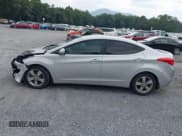 ✅ 2013 Hyundai Elantra GLS • VIN: KMHDH4AE8DU829579 • Lot: 42940329. Listed on IAAI with 153,115 mi. Free auction sales archive from the USA and detailed vehicle history report at DreamBid. Image 15.