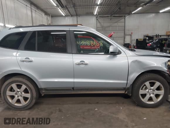 ✅ 2007 Hyundai Santa Fe SE • VIN: 5NMSH73E27H015532 • Lot: 43588168. Listed on IAAI with 234,056 mi. Free auction sales archive from the USA and detailed vehicle history report at DreamBid. Image 14.