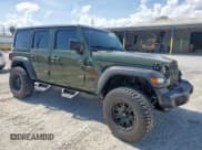✅ 2023 Jeep Wrangler Sport S • VIN: 1C4HJXDN3PW668607 • Lot: 82329385. Listed on Copart with 23,331 mi. Free auction sales archive from the USA and detailed vehicle history report at DreamBid. Image 4.