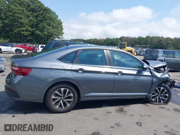 ✅ 2023 Volkswagen Jetta S • VIN: 3VW5M7BU3PM052553 • Lot: 43024368. Listed on IAAI with 20,062 mi. Free auction sales archive from the USA and detailed vehicle history report at DreamBid. Image 14.
