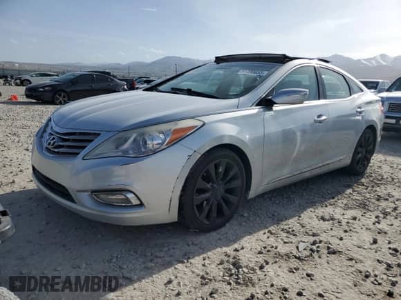 2013 Hyundai Azera с VIN KMHFH4JG1DA230244, выставлен на аукционе Copart как лот 51990655 с пробегом 150 607 миль миль и Списание • Salvage title. История ставок и продаж доступна на DreamBid. Изображение 1.
