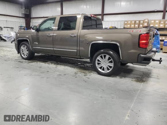 2014 Chevrolet Silverado 1500 High Country with VIN 3GCUKTEC3EG504349, listed as a Copart auction lot 90039305 with 184,901 mi miles and Clean title. Bid and sale history available at DreamBid. Image 2.