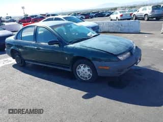 1996 Saturn SL with VIN 1G8ZG5283TZ360599, listed as a IAAI auction lot 43583109 with 206,429 mi miles and . Bid and sale history available at DreamBid. Image 1.