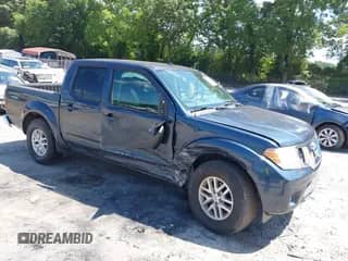 2015 Nissan Frontier SV z VIN 1N6AD0ER2FN737497, wystawiony jako IAAI lot #42561512 z przebiegiem 127 234 mil mil oraz . Historia ofert i sprzedaży dostępna na DreamBid. Obrazek 1.