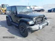 ✅ 2015 Jeep Wrangler Sport • VIN: 1C4AJWAG1FL594007 • Lot: 43779956. Listed on IAAI with 170,911 mi. Free auction sales archive from the USA and detailed vehicle history report at DreamBid. Image 1.