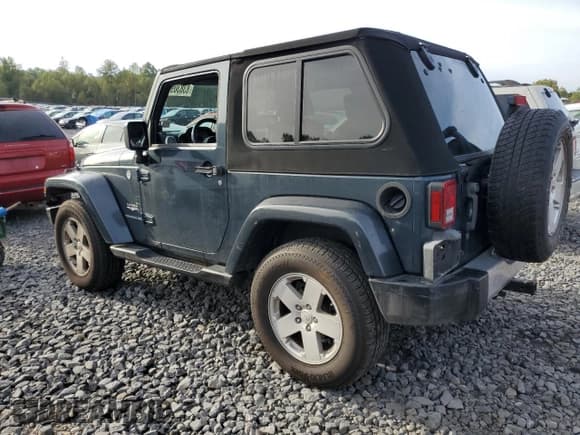 ✅ 2008 Jeep Wrangler Sahara • VIN: 1J8FA541X8L519597 • Лот: 83830965. Опубликован ранее на Copart с пробегом 141 463 миль. Бесплатный доступ к архиву аукционных продаж из США и подробный отчёт об истории автомобиля на DreamBid. Изображение 2.