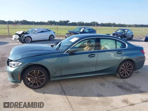 2021 BMW 3 Series 330i с VIN 3MW5R1J06M8B87978, выставлен на аукционе IAAI как лот 42752044 с пробегом 41 707 миль миль и . История ставок и продаж доступна на DreamBid. Изображение 14.