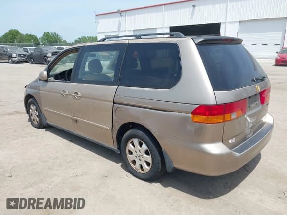 ✅ 2003 Honda Odyssey EX-L • VIN: 5FNRL18733B002370 • Лот: 42080346. Опубликован ранее на IAAI с пробегом 199 289 миль. Бесплатный доступ к архиву аукционных продаж из США и подробный отчёт об истории автомобиля на DreamBid. Изображение 3.