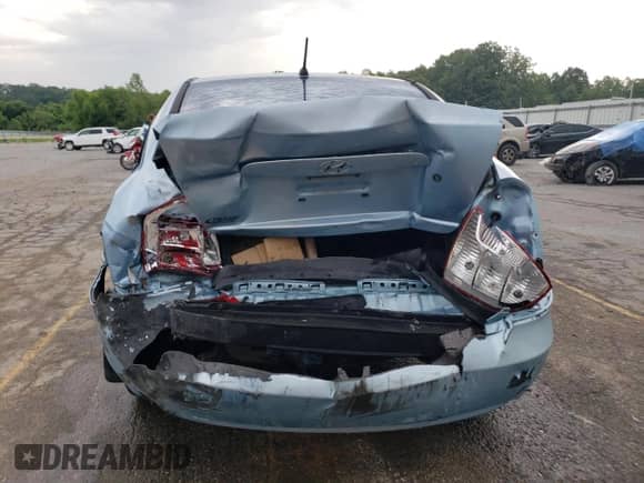 2007 Hyundai Accent GLS with VIN KMHCN46CX7U132172, listed as a Copart auction lot 61669064 with 220,897 mi miles and Salvage title. Bid and sale history available at DreamBid. Image 6.