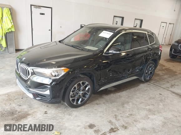 ✅ 2022 BMW X1 xDrive28i • VIN: WBXJG9C09N5U69567 • Lot: 42273644. Listed on IAAI with 36,944 mi. Free auction sales archive from the USA and detailed vehicle history report at DreamBid. Image 2.