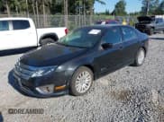 ✅ 2011 Ford Fusion Hybrid • VIN: 3FADP0L31BR297744 • Lot: 42744443. Wystawiony na IAAI z przebiegiem 118 633 mil. Bezpłatny archiwum sprzedaży aukcyjnych z USA i szczegółowy raport historii pojazdu na DreamBid. Zdjęcie 18.