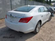 ✅ 2015 Buick LaCrosse Leather • VIN: 1G4GB5G35FF166165 • Lot: 42914744. Wystawiony na IAAI z przebiegiem 120 257 mil. Bezpłatny archiwum sprzedaży aukcyjnych z USA i szczegółowy raport historii pojazdu na DreamBid. Zdjęcie 4.
