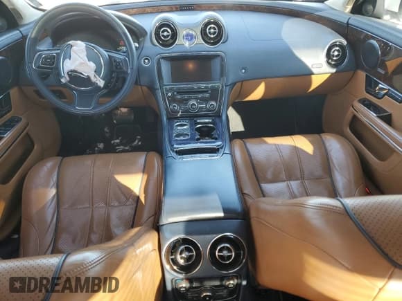 ✅ 2013 Jaguar XJ • VIN: SAJWA1C72D8V40156 • Лот: 50676735. Опубликован ранее на Copart с пробегом Не указан. Бесплатный доступ к архиву аукционных продаж из США и подробный отчёт об истории автомобиля на DreamBid. Изображение 8.