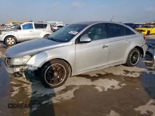 ✅ 2013 Chevrolet Cruze 1LT • VIN: 1G1PD5SB6D7239914 • Lot: 48704635. Listed on Copart with 115,797 mi. Free auction sales archive from the USA and detailed vehicle history report at DreamBid. Image 1.