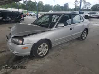 2004 Hyundai Elantra GLS with VIN KMHDN46D14U773672, listed as a Copart auction lot 69194635 with 189,128 mi miles and Salvage title. Bid and sale history available at DreamBid. Image 1.