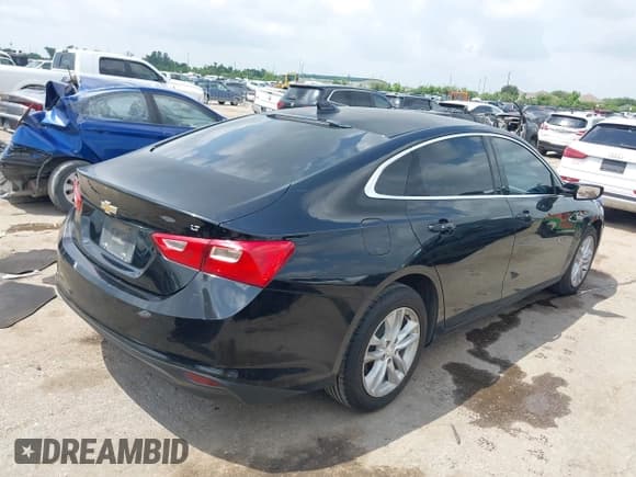 ✅ 2018 Chevrolet Malibu LT • VIN: 1G1ZD5ST3JF104506 • Lot: 42118533. Listed on IAAI with 183,698 mi. Free auction sales archive from the USA and detailed vehicle history report at DreamBid. Image 4.