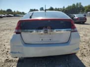 ✅ 2014 Honda Insight LX • VIN: JHMZE2H57ES000818 • Lot: 81487865. Wystawiony na Copart z przebiegiem 125 469 mil. Bezpłatny archiwum sprzedaży aukcyjnych z USA i szczegółowy raport historii pojazdu na DreamBid. Zdjęcie 6.