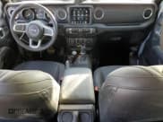 ✅ 2023 Jeep Wrangler Sahara • VIN: 1C4JJXP60PW689291 • Lot: 89404295. Listed on Copart with 9,028 mi. Free auction sales archive from the USA and detailed vehicle history report at DreamBid. Image 8.