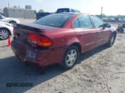 ✅ 2002 Oldsmobile Alero GL1 • VIN: 1G3NL52E02C215561 • Lot: 42230290. Wystawiony na IAAI z przebiegiem 177 176 mil. Bezpłatny archiwum sprzedaży aukcyjnych z USA i szczegółowy raport historii pojazdu na DreamBid. Zdjęcie 4.
