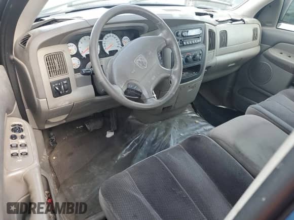 2003 Dodge 1500 ST z VIN 1D7HA18D23J656203, wystawiony jako Copart lot #71764524 z przebiegiem 156 707 mil mil oraz Szkoda całkowita • Salvage title. Historia ofert i sprzedaży dostępna na DreamBid. Obrazek 8.