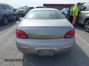 ✅ 1999 Chrysler Concorde • VIN: 2C3HD46J2XH558909 • Lot: 43070725. Listed on IAAI with 118,396 mi. Free auction sales archive from the USA and detailed vehicle history report at DreamBid. Image 16.