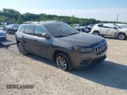 ✅ 2021 Jeep Cherokee 80th Anniversary • VIN: 1C4PJMMX3MD115880 • Lot: 42920159. Listed on IAAI with 56,245 mi. Free auction sales archive from the USA and detailed vehicle history report at DreamBid. Image 1.