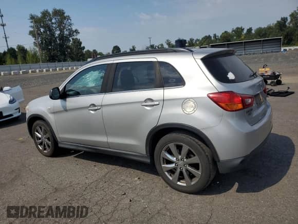 2013 Mitsubishi Outlander LE with VIN 4A4AR5AU1DE022535, listed as a Copart auction lot 70002895 with 297,561 mi miles and Salvage title. Bid and sale history available at DreamBid. Image 2.