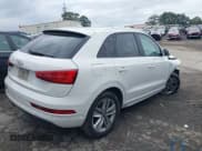 ✅ 2017 Audi Q3 Premium • VIN: WA1BCCFS2HR009908 • Lot: 41867249. Listed on IAAI with 116,804 mi. Free auction sales archive from the USA and detailed vehicle history report at DreamBid. Image 4.