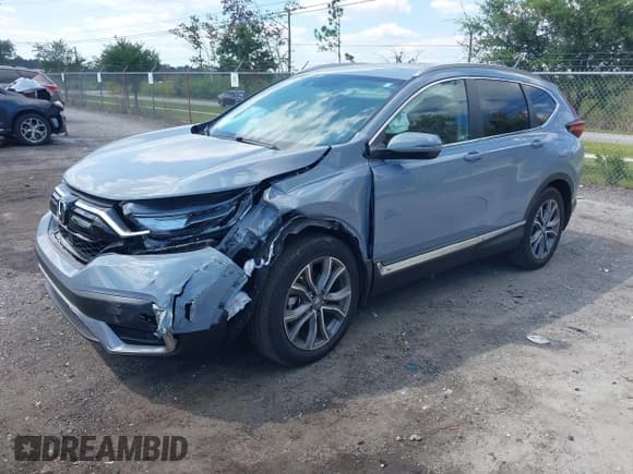 ✅ 2020 Honda CR-V Touring • VIN: 2HKRW1H9XLH404462 • Lot: 43198639. Listed on IAAI with 20,878 mi. Free auction sales archive from the USA and detailed vehicle history report at DreamBid. Image 2.