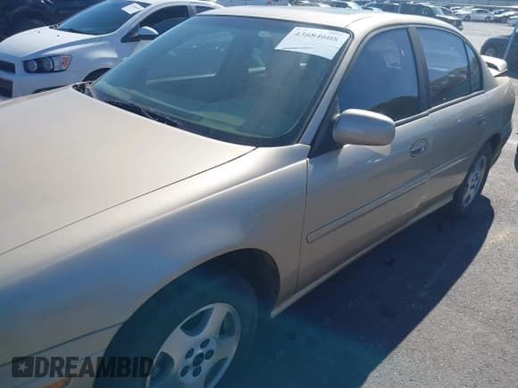 ✅ 2003 Chevrolet Malibu LS • VIN: 1G1NE52J33M615058 • Lot: 43684608. Listed on IAAI with 138,574 mi. Free auction sales archive from the USA and detailed vehicle history report at DreamBid. Image 6.