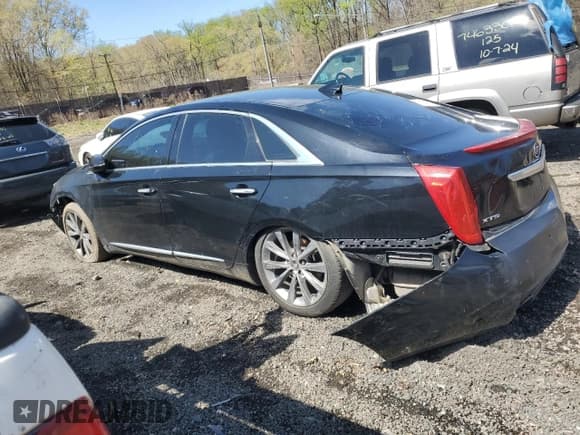✅ 2015 Cadillac XTS Livery • VIN: 2G61U5S35F9140236 • Lot: 51765205. Listed on Copart with 266,051 mi. Free auction sales archive from the USA and detailed vehicle history report at DreamBid. Image 2.