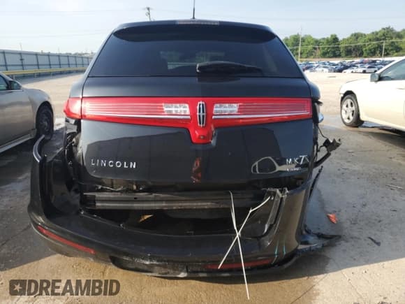 ✅ 2015 Lincoln MKT EcoBoost • VIN: 2LMHJ5AT2FBL04525 • Лот: 57353095. Опубликован ранее на Copart с пробегом 86 759 миль. Бесплатный доступ к архиву аукционных продаж из США и подробный отчёт об истории автомобиля на DreamBid. Изображение 6.