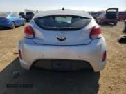 ✅ 2014 Hyundai Veloster • VIN: KMHTC6AD2EU191070 • Lot: 70097094. Wystawiony na Copart z przebiegiem 65 384 mil. Bezpłatny archiwum sprzedaży aukcyjnych z USA i szczegółowy raport historii pojazdu na DreamBid. Zdjęcie 6.